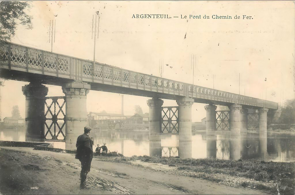 Historic railway bridge at Argenteuil crossing the Seine, photographed during the late nineteenth or early twentieth century, similar to the bridges painted by Claude Monet.